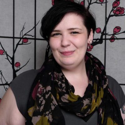 Casandra is a wellness focused, trauma-informed counselor who is passionate about helping people in diverse relationships uncover and embrace their true selves and live happier/healthier lives. She focuses on using Neuro-Narrative, emotion-focused theories, with a heavy dash of systems thinking and attachment theory, to help people struggling with sexual trauma, relationship issues, depression, bipolar disorders, schizophrenic spectrum disorders, anxiety, or minority stigma-related stress. She has extensive backgrounds in non-monogamy, kink/BDSM, sex-positive counseling, gay stuff, and living with chronic conditions/disabilities/diseases.